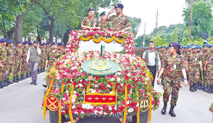 Chief of Army Staff General SM Shafiuddin Ahmed is bid a flowery farewell following military tradition at Savar Cantonment on Wednesday. -ISPR Photo