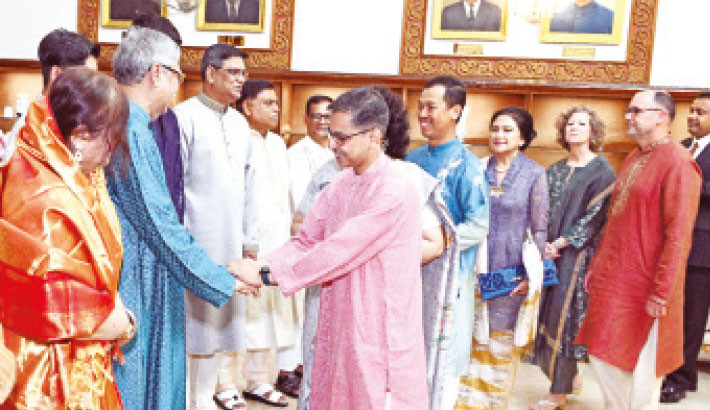 President Mohammed Shahabuddin exchanges greetings with the diplomats at Bangabhaban on the occasion of Eid-ul-Azha on Monday.  -PID PHOTO